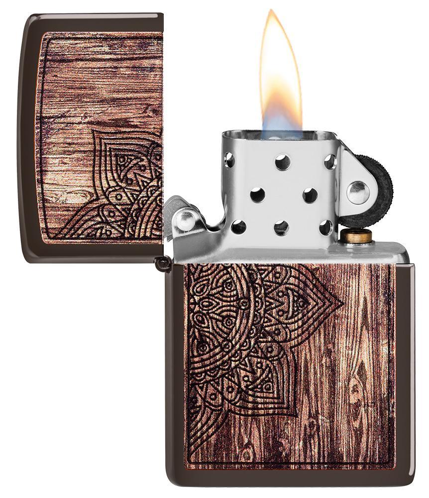 Wood Mandala Design Brown Matte Windproof Lighter with its lid open and lit